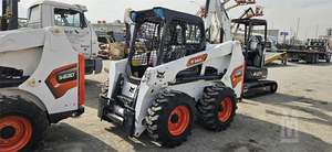 Chargeuse compacte sur pneus T770 d'occasion certifiée EPA, capacité de charge nominale de 5 tonnes, chargeuse frontale, moteur diesel Cat, engin de chantier - Product Image 4