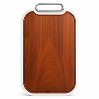 Planche à découper en bois d'acacia avec découpe semi-circulaire aux coins, poignée en métal noir pour servir viande et légumes en cuisine