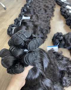 Extensiones de cabello ondulado natural virgen sin procesar de trama de cabello vietnamita crudo más vendido precio de fábrica - Product Image 1