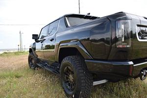 GMC Hummer-EV 3X Pickup CREW PICKUP ÉLECTRIQUE À TROIS RÉSEAUSSURES MOTRICES 2024 - Product Image 3