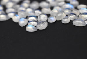 Cabujones de pera de piedra lunar de arcoíris natural 5X3mm a 10X7mm Cabujones de piedras preciosas sueltas de piedras preciosas de cristal de Fuego Azul - Product Image 4