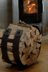 Durable outdoor iron <b>log</b> rack with weather resistant finish for storing <b>logs</b> beside backyard fire pits during rainy <b>seasons</b> - Product Image 6