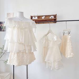 Top de Gasa sin Mangas con Volantes en Capas Blancas de Alta Calidad para Mujer - Product Image 1