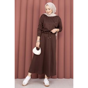 Ensemble décontracté deux pièces marron café pour femme avec détails poches, haut court et jupe, disponible en tailles XS, XXS, XL - Product Image 1