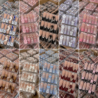 Faux ongles de luxe faits à la main, longs et carrés, à presser, avec nœud en cristal en forme de tuyau et fleurs 3D, vente en gros directe usine