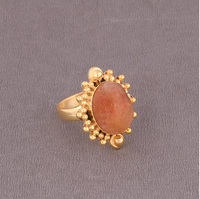 Vente en gros de bagues élégantes en laiton plaqué or de créateur en cristal orange avec diamant et pierre de soleil, bijoux de mode, bagues naturelles vente en gros