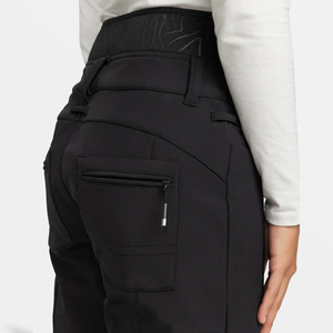 Pantalones de esquí para mujer con producción OEM personalizada Impresión de logotipo de material transpirable impermeable y opciones de etiqueta privada - Product Image 4