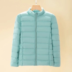 Abrigo de invierno con cremallera de color sólido, chaqueta informal acolchada de manga larga con cuello levantado, cárdigan grueso de lona para uso en exteriores, mantiene el calor - Product Image 2