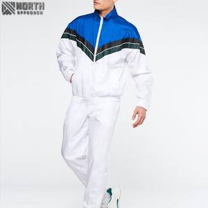 Chándal personalizado en blanco de alta calidad al por mayor, ropa deportiva con bloques de Color, conjunto de joggers con capucha para hombre, chándal Vintage - Product Image 1