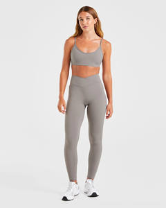Vente en gros de leggings d'enveloppement sculptés gris fumée personnalisés coupe sculptée enveloppement flatteur taille élastique vêtements de sport leggings de yoga pour femmes - Product Image 3
