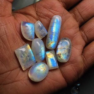 Fuego azul de calidad superior Arco Iris Natural Piedra lunar Rebanadas en bruto Piedras preciosas Precio al por mayor Venta Cabujones en bruto sin cortar Piedra lunar OEM - Product Image 4