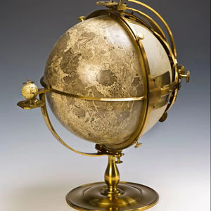 Handcrafted marine inspired armillary sphere in polished brass with stylish tripod base for rustic or nautical home environments - Product Image 1