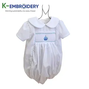 Vêtements pour enfants smockés Blanc Solide Smocked Cupcake jumpsuits playsuit body haute qualité vêtements pour enfants K-Broderie