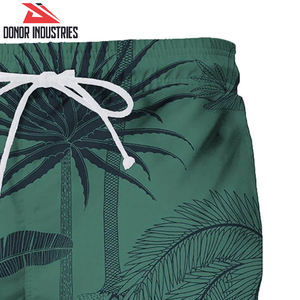 กางเกงขาสั้นโพลีเอสเตอร์สำหรับผู้ชายใส่วิ่งฟิตเนสพิมพ์ลายใบไม้สีสันสดใสมีเชือกผูกเอวยางยืดใส่กลางแจ้งแบบลำลอง - Product Image 2