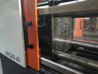 Machine de moulage par injection plastique verticale Jetmaster 2024, bon état de marche, JM 128 tonnes, petite machine à pompe