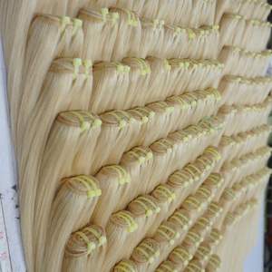 Extensions de cheveux humains vierges cambodgiens blonds naturels 100% non-remy, tissage double trame à la machine, fabriquées en usine vietnamienne - Product Image 1