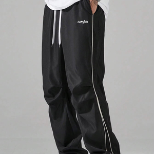 Pantalones casuales a rayas de cintura alta para hombre Diseño de tres colores con estilo frontal inteligente para deportes Fitness Jogging en primavera - Product Image 1