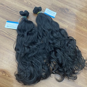 Extensiones de cabello ondulado natural de tendencia caliente Cabello humano vietnamita sin procesar de alta calidad Sin desprendimiento Sin enredos - Product Image 1