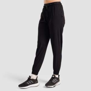 Pantalones Deportivos Transpirables de Cintura Media con Flexibilidad para Movimiento, Estilo Casual Negro para la Temporada de Primavera - Product Image 1