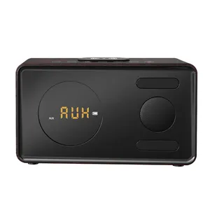 New Type Portable FM radio Alarm Clock Mobile Phone Wireless Charging Rechargeable Bluetooth Speaker