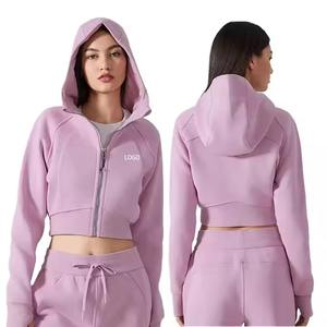 Venta al por mayor de dos piezas Crop Top Sudadera con capucha y pantalones de chándal para las mujeres logotipo personalizado de punto de gran tamaño Jersey recortado con capucha Conjunto de las mujeres - Product Image 1