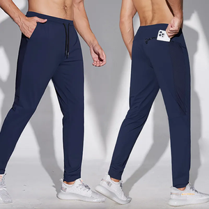 Venta al por mayor Slim Fit con bolsillos Hombres Entrenamiento Gimnasio Joggers Nylon Pantalones de chándal Malla ligera Hombres Joggers - Product Image 1