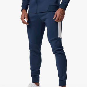 Joggers bleus durables de haute qualité pour hommes Ceinture élastique et panneau latéral contrasté en blanc avec poches - Product Image 1