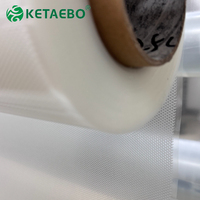 Film adhésif thermofusible haute élasticité transparent en rouleau pour vêtements de sport et pantalons de yoga sans couture