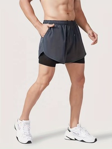 Shorts de sport pour homme, couleur unie, avec poches, séchage rapide, taille élastique, longueur mi-cuisse, en spandex et polyester, pour l'entraînement - Product Image 5