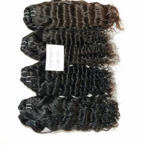 Vente en gros d'extensions de cheveux humains de temple indien vierge paquets de cheveux ondulés naturels bruts de couleur noire non traités à cuticule alignée - Product Image 1