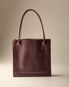 Bolsa de Mano Multiusos de Cuero Resistente - Product Image 1