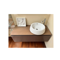 Meuble-lavabo mural moderne de marque italienne, finition marron chocolat mat, avec dessus en porcelaine aspect pierre, tiroir spacieux, prêt à l'emploi avec robinetterie de salle de bain