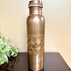 Gran demanda Venta Perforado Medio Cobre Botella 1 L, Una mezcla única de estilo y funcionalidad El Perforado Medio Cobre Botella 1000ML - Product Image 1