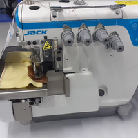 Machine à coudre industrielle surjeteuse à quatre fils à entraînement direct informatisée JACK E4 d'occasion