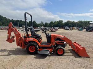 Tracteur à roues Kubota BX-25D d'occasion avec tondeuse et chargeur frontal, moteur 25/30/50 CV et composants de transmission essentiels - Product Image 5