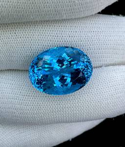 บลูโทแพซสวิสแท้ 100% รูปทรงวงรีเหลี่ยมเพชรพลอย สีฟ้าสวิส สะอาดตา ขนาดใหญ่ พลอยหลวม - Product Image 1