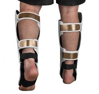Protège-tibias de boxe Muay Thai MMA OEM personnalisés avec logo BHUTTA ENTERPRISES BE-66013, protection professionnelle pour l'entraînement des adultes