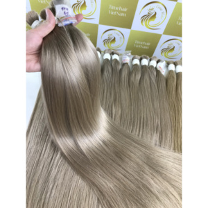 Venta al por mayor gran stock Frío marrón Luz a granel Paquetes de cabello vietnamita Color personalizable 100% Extensiones naturales de gran calidad - Product Image 1