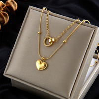 Collier tendance en acier inoxydable plaqué or 18 carats avec pendentif cœur, idéal pour femme, cadeau de fête, prêt à l'emploi, vente en gros