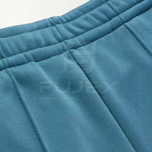 กางเกงผ้าฝ้ายเอวสูงสำหรับผู้ชายกางเกงวอร์มทรงหลวมแบบกำหนดเองพร้อมกระเป๋าตกแต่งสตรีทแวร์แบบลำลองขายส่ง - Product Image 4