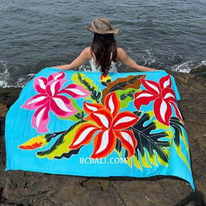 Experience Bali vibrant charm with our Summer Collection unique hand painted rayon sarongs featuring exquisite floral designs - Product Image 1