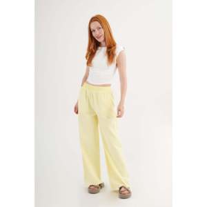 Pantalon Lustrin pour femme, jaune, 100 % coton, taille élastique, avec détail à l'ourlet et poches, pour commandes en gros - Product Image 1