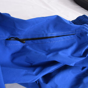 กางเกงสโนว์บอร์ดสำหรับผู้ชายกางเกงเล่นสกีทรงหลวมน้ำหนักเบาสำหรับกลางแจ้งฤดูหนาวกันน้ำออกแบบได้ตามต้องการ - Product Image 5