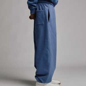 กางเกงสเวตเตอร์ทรงหลวมผ้าฝ้ายแบบหนาทรงหลวมสำหรับทุกเพศกางเกงเหงื่อผ้าฝ้าย100% เรียบง่ายคุณภาพสูงขายส่ง - Product Image 5