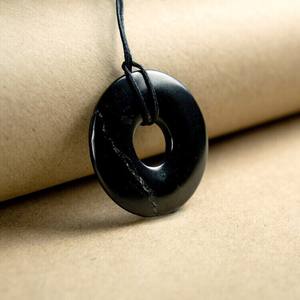 Colgante de Shungita pulido en forma de donut de 1.8 pulgadas (45 mm) - Product Image 1