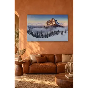 Impression sur toile du sommet enneigé de Fida qui se dévoile au-dessus d'un océan de nuages - Product Image 3