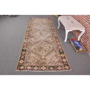 Turkish Vintage Rug 3.5x9.7 ft (108x297 cm), <b>Brown</b> Animal Print <b>Wool</b> Rug - Product Image 1