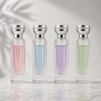 Botella de Perfume de Vidrio Cilíndrica de Lujo Directo de Fábrica, Nuevo Diseño con Tapa en Forma de Corona, 50ml 75ml, Presurizada con Pulverizador