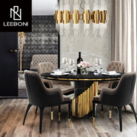 Mobilier de salle à manger haut de gamme table en marbre noir original de luxe avec centre tournant grande table à manger ronde 10 places