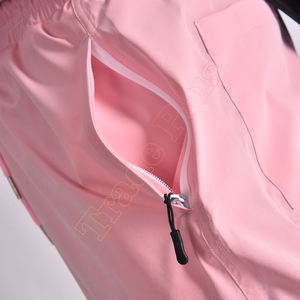 Pantalones de esquí impermeables de color rosa claro al por mayor para Uniesx con cintura ajustable y bolsillos cargo con cremallera pantalones holgados de esquí - Product Image 4